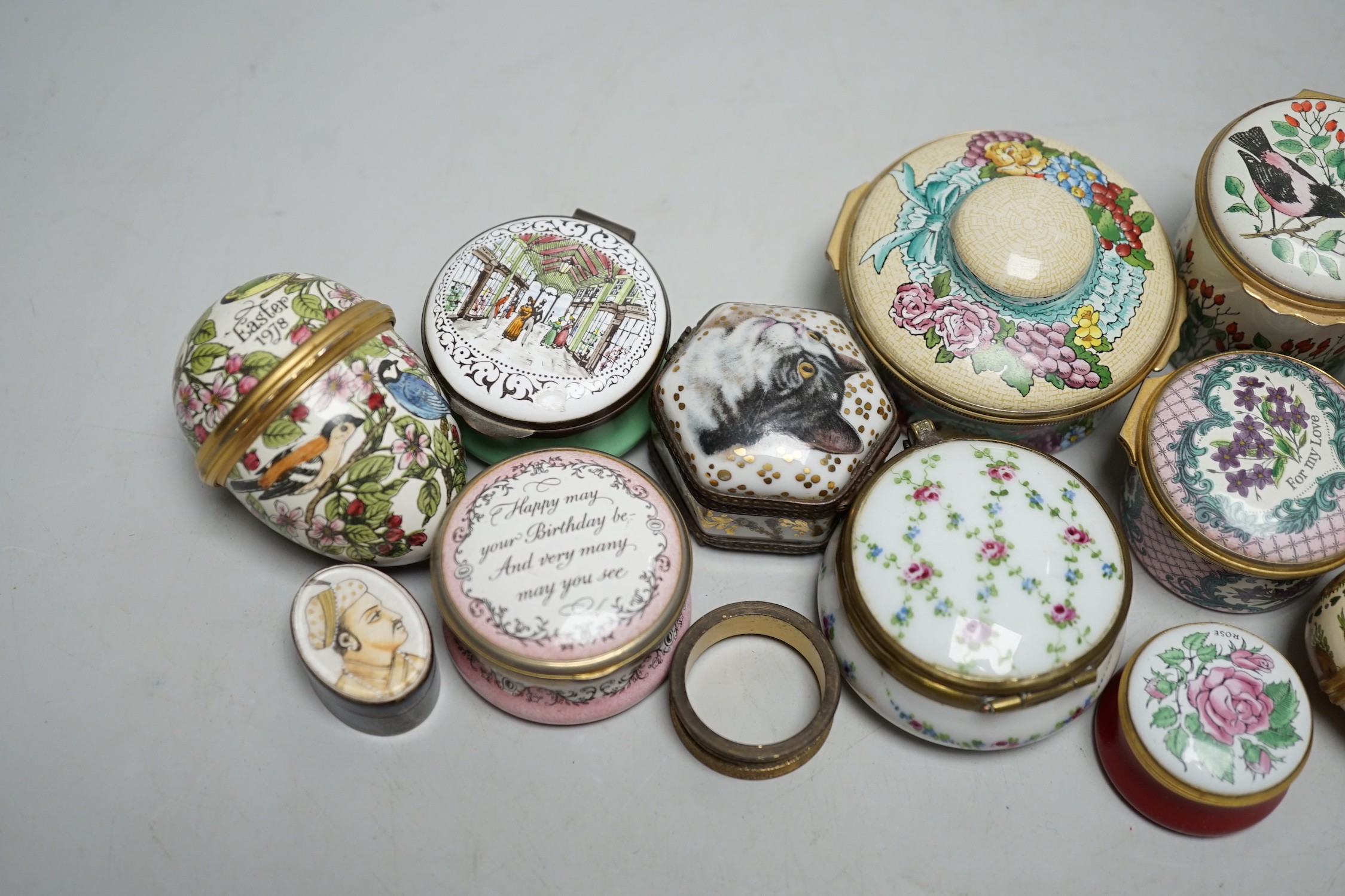 A group of various Halcyon Days and other enamel boxes, approximately twelve items